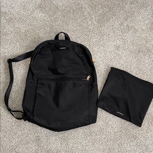 Tumi Black Backpack with Gold Accents